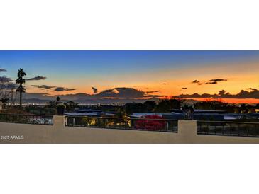 Scenic sunset view overlooking city lights, showcasing the serene location at 3500 E Lincoln Dr # 6, Phoenix, AZ 85018