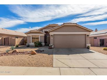 Charming single-story home features a two-car garage and low-maintenance desert landscaping at 2263 E Mariposa Grande --, Phoenix, AZ 85024