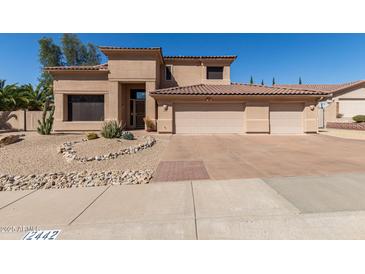 Beautiful desert home with a three-car garage and well-maintained desert landscaping at 12442 N Via La Playa --, Fountain Hills, AZ 85268