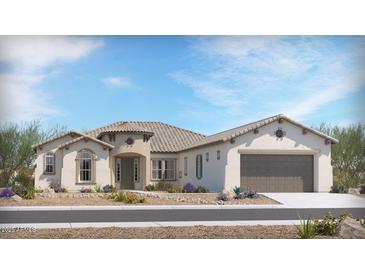Charming single-story home featuring a tile roof, neutral stucco exterior, and a well-manicured desert landscape at 14741 N 73Rd Dr, Peoria, AZ 85381