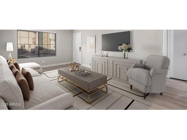 Cozy living room featuring modern furniture, neutral tones, and stylish decor at 1905 E University Dr # 162, Tempe, AZ 85288
