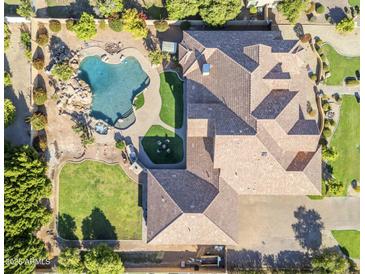 Overhead view of a property with a large pool, spa, lush landscaping, and a spacious outdoor area at 3446 E Knoll St, Mesa, AZ 85213