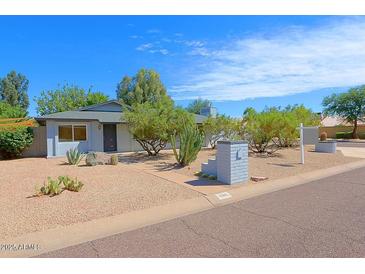 Charming single story home with desert landscaping and mature trees at 17801 N 43Rd Way, Phoenix, AZ 85032