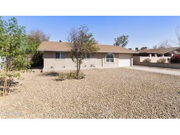 Well-maintained single-Gathering home with a desert landscape and a traditional architectural style at 2530 E Randall Dr, Tempe, AZ 85288