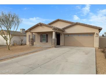 Charming single-story home featuring a two-car garage and a well-maintained front yard at 2540 E Atlanta Ave, Phoenix, AZ 85040