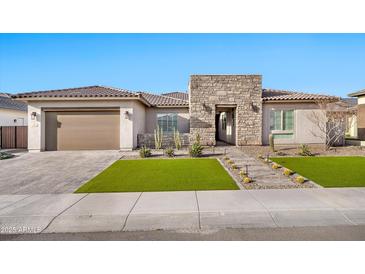 Charming single-story home features a desert-landscaped front yard and an inviting stone entryway at 1464 E Aris Dr, Gilbert, AZ 85298