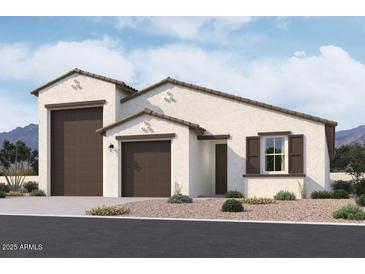 Charming single-story home boasting a neutral color palette, a two-car garage, and low maintenance desert landscaping at 32087 N Lone Rancher Way, San Tan Valley, AZ 85140