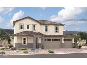 Charming two-story home with a two car garage and desert landscaping at 12373 W Marguerite Ave, Avondale, AZ 85323