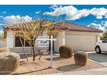 Charming single-story home with a well-maintained front yard and a two-car garage at 28617 N 50Th Pl, Cave Creek, AZ 85331