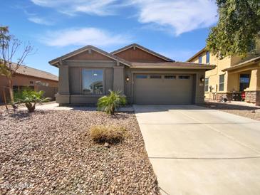 Charming single story home with desert landscaping and attached two car garage at 2345 E Alida Trl, Casa Grande, AZ 85194