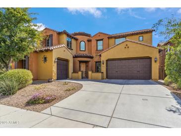 Stunning two-story home with a three-car garage and beautiful Southwestern architecture at 3713 E Cat Balue Dr, Phoenix, AZ 85050