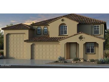 Stunning two-story home with a tile roof and a spacious three-car garage at 5124 W Top Hand Trl, Laveen, AZ 85339