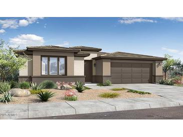 Charming single-story home with a two-car garage, desert landscaping, and neutral color palette at 39174 N Kaden Ln, San Tan Valley, AZ 85140