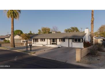 Inviting home featuring a manicured front yard, providing a warm and welcoming curb appeal for a potential buyer at 7819 N 17Th Ave, Phoenix, AZ 85021