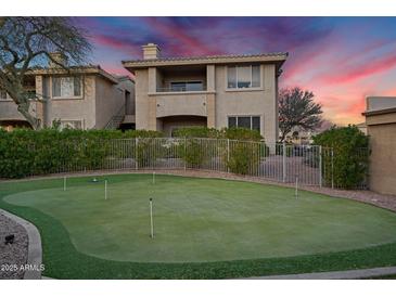 Beautiful two-story condo with a putting green and well maintained landscaping at 16013 S Desert Foothills Pkwy # 2089, Phoenix, AZ 85048