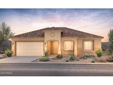 Charming single-story home with a stucco exterior, two-car garage, and desert landscaping at 7888 W Mockingbird Way, Florence, AZ 85132