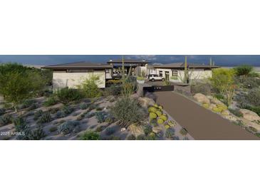 A modern home featuring desert landscaping, a private driveway, and a stylish exterior design at 8395 E Leaning Rock Rd # 187, Scottsdale, AZ 85266