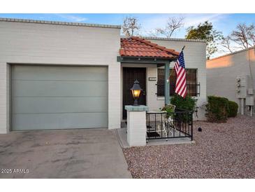 Charming single-story home with a garage and landscaped front yard at 4328 E Capri Ave # 171, Mesa, AZ 85206