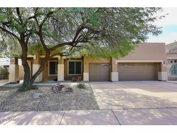 Charming single-story home featuring a low maintenance yard and a two-car garage at 3223 W Rapalo Rd, Phoenix, AZ 85086