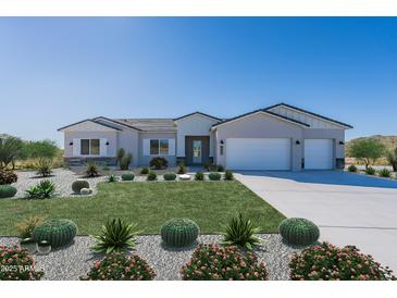 Charming single-story home with a three-car garage, lush landscaping, and desert accents at 33417 N 142Nd Way, Scottsdale, AZ 85252