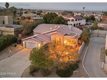 Stunning home featuring an attached garage, and an inviting patio, perfect for relaxing evenings at 15510 E Sycamore Dr, Fountain Hills, AZ 85268