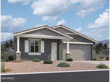 Charming single-story home with a two-car garage, neutral color palette and low-maintenance desert landscaping at 7701 W Avenida Del Rey --, Peoria, AZ 85383