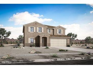 Two-story home featuring desert landscaping, a two-car garage, neutral toned shutters and a covered front porch at 17264 W Via Dona Rd, Surprise, AZ 85387
