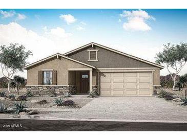 Charming single-story home featuring desert landscaping and a spacious two-car garage at 17281 W Via Dona Rd, Surprise, AZ 85387