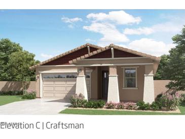 Charming single-story home with a two-car garage, beautiful landscaping, and neutral color palette at 4661 E French Rd, San Tan Valley, AZ 85143