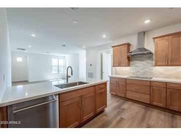 Gourmet kitchen with a large island, stainless steel appliances, and custom cabinetry, perfect for cooking and entertaining at 2121 W Sonoran Desert Dr # 93, Phoenix, AZ 85085