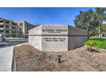 Community entrance sign for Biltmore Terrace Condominiums shows complex name and street names at 5102 N 31St Pl # 436, Phoenix, AZ 85016