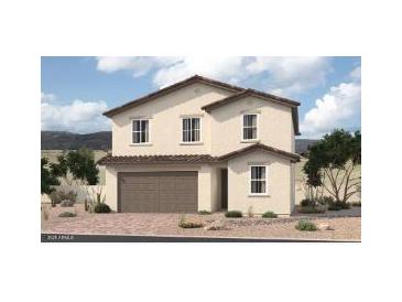 Charming two-story home features a neutral stucco exterior, a two-car garage and desert landscaping at 11601 W Green Dr, Youngtown, AZ 85363
