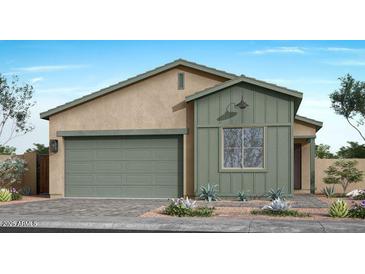 Charming single-story home with a two-car garage and well-maintained landscaping at 366 E Las Perlas Ln, San Tan Valley, AZ 85140