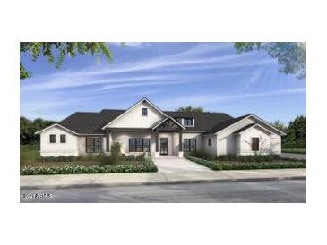 Charming single-story home boasts symmetrical design, inviting entry, and black roof at 12373 W Blackhawk Rd, Casa Grande, AZ 85194