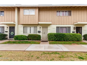 Charming townhomes featuring well-maintained landscaping, neutral paint, and a cozy, inviting facade at 5339 N Black Canyon Hwy, Phoenix, AZ 85015