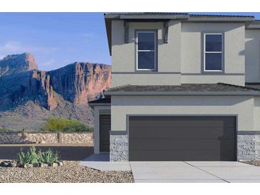 Beautiful home exterior showcasing modern design and stunning mountain views at 5850 E Ringtail Way, Phoenix, AZ 85054