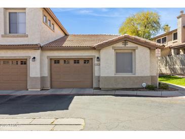 Beautful, cozy townhouse with an attached garage, desert landscaping, and an HOA at 1024 E Frye Rd # 1063, Phoenix, AZ 85048