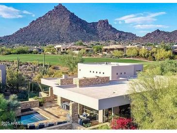 Stunning home boasts a pool, patio, and mountain views; a perfect blend of luxury and nature at 10801 E Happy Valley Rd # 4, Scottsdale, AZ 85255