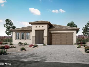 Charming single-story home featuring a low-pitched roofline, neutral colors, and a two-car garage at 28285 N 134Th Dr, Peoria, AZ 85383