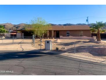 Charming single-story home with mountain views and low-maintenance desert landscaping at 8640 S 16Th Pl, Phoenix, AZ 85042