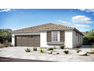 A charming single-story home with neutral colors, complemented by a well-maintained front yard and a two-car garage at 14493 W Sand Hills Rd, Surprise, AZ 85387