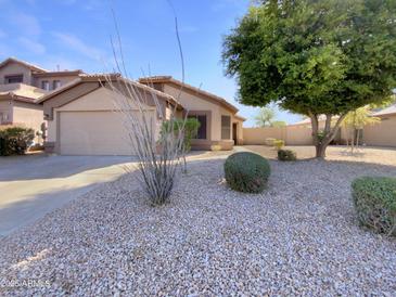 Charming single-story home featuring desert landscaping with a two-car garage and neutral paint at 3527 N Kashmir --, Mesa, AZ 85215