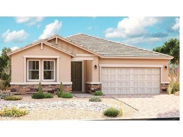 Charming single-story home with a desert landscaped front yard and a two-car garage at 40578 W Michaels Dr, Maricopa, AZ 85138