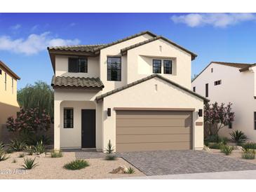 Charming two-story home featuring a neutral color scheme and attached two-car garage at 2421 W Los Arboles Pl, Chandler, AZ 85224