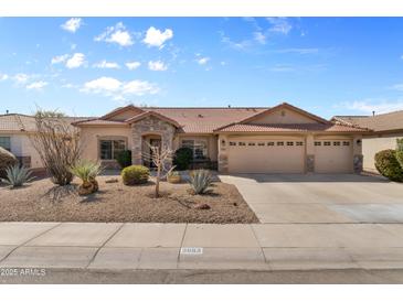 Charming single-story home featuring a three-car garage and desert landscaping at 3663 E Camden Ave, San Tan Valley, AZ 85140