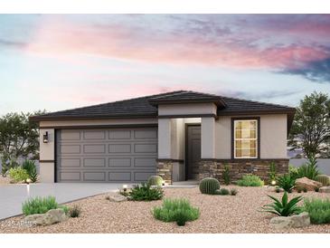 Charming single-story home featuring desert landscaping and a spacious two-car garage at 4397 S Siphon Draw Rd, Apache Junction, AZ 85119