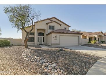 Charming two-story home with desert landscaping, and a two car garage at 20802 N 74Th Ln, Glendale, AZ 85308