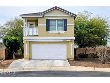 Charming two-story home with a two-car garage and inviting curb appeal, perfect for a Gathering at 18293 W Elm St, Surprise, AZ 85388