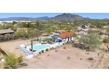Beautiful desert home with a fenced pool and patio area perfect for outdoor entertainment at 33810 N Smokehouse Trl, Cave Creek, AZ 85331