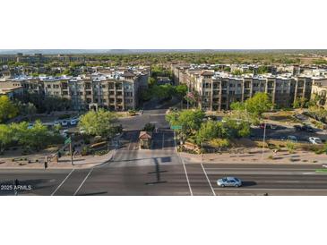 Stunning aerial view of the community featuring lush landscaping and well-maintained buildings at 5450 E Deer Valley Dr # 3008, Phoenix, AZ 85054